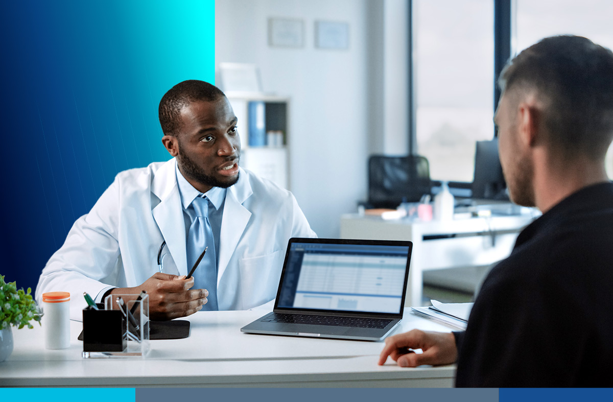 African Doctor and Patient Laptop cloud-based eHR system Altron HealthTech